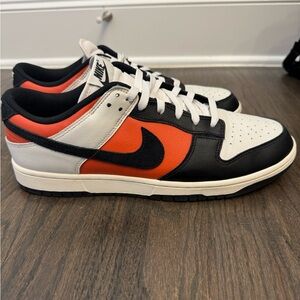 Nike Dunk Low Retro sneakers in the "Phantom/Black-Vintage Coral